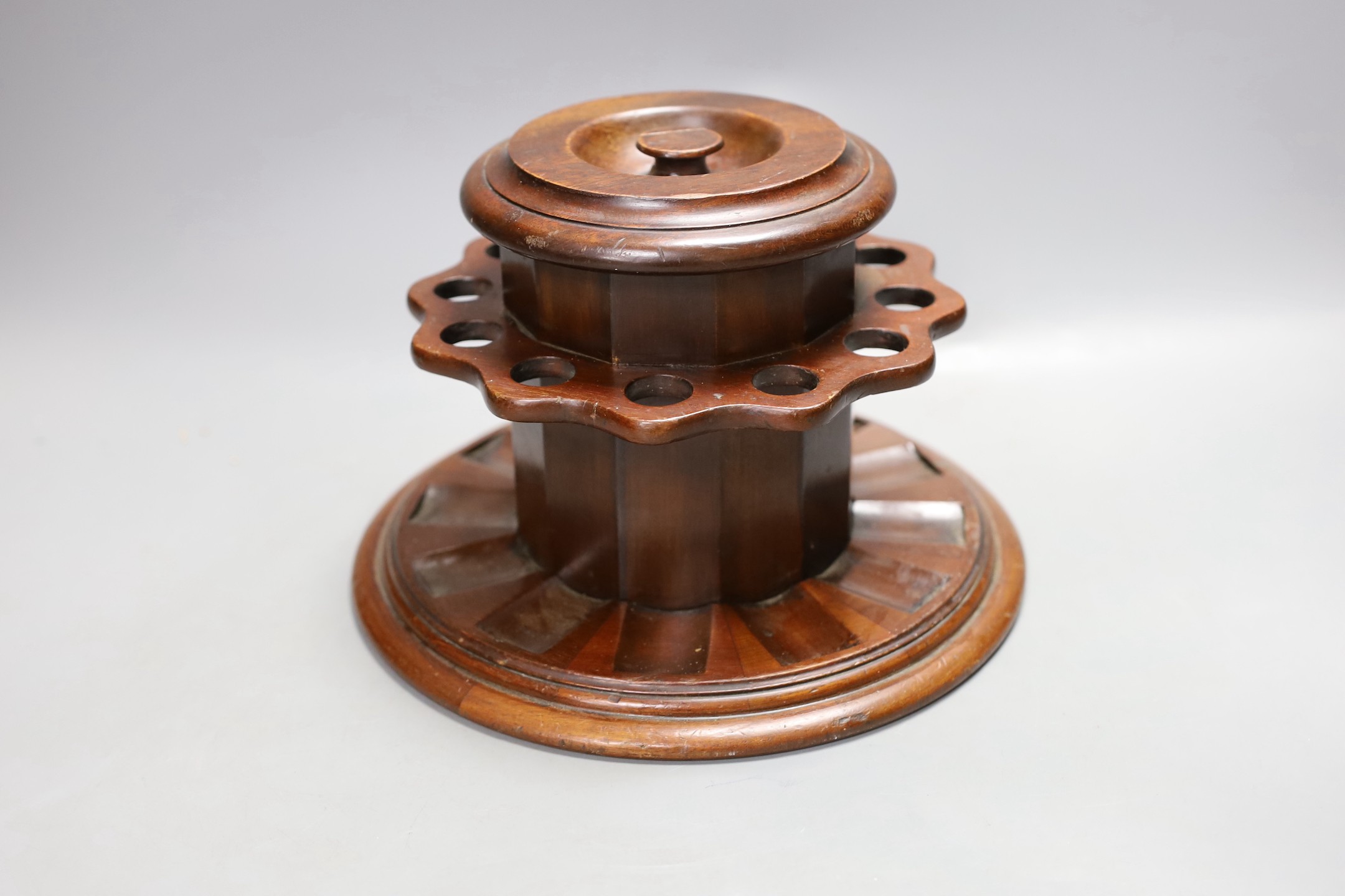 A Dunhill mahogany ‘airtight’ tobacco box/pipe holder, 15cm high.
